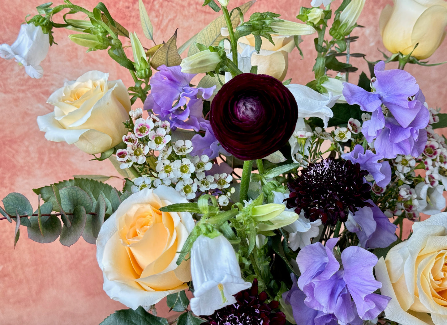 Regina - Yellow and lavender flowers in vase